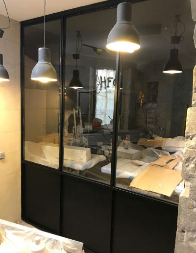 Installation d'une vérrière en métal sur meusure pour un appartement à Grenoble en Isère par Renov'isol